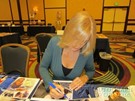 Erika Eleniak signing proof