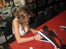 Nicole Zeoli signing proof